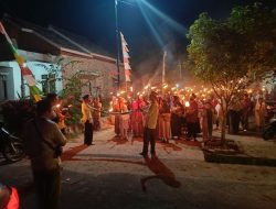 Sambut Tahun Baru Islam 1446 H, Polisi Berikan Pengamanan Pawai Obor di Km 5 Blambangan Umpu