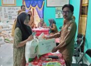 Pemerintahan pekon Baturaja salur kan bantuan ketahanan pangan berupa beras