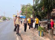 Green Policing, Polisi Bersama Masyarakat Gotong Royong Jaga Kebersihan di Simpang 4 Negeri Baru