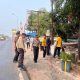 Green Policing, Polisi Bersama Masyarakat Gotong Royong Jaga Kebersihan di Simpang 4 Negeri Baru
